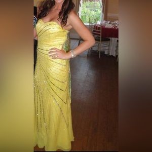 Yellow sequined designer gown